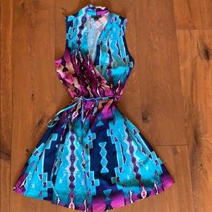 Faux wrap dress with Western/Aztec print. Colorful